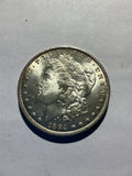 Lot 30, 1884 O Morgan silver dollar, BU