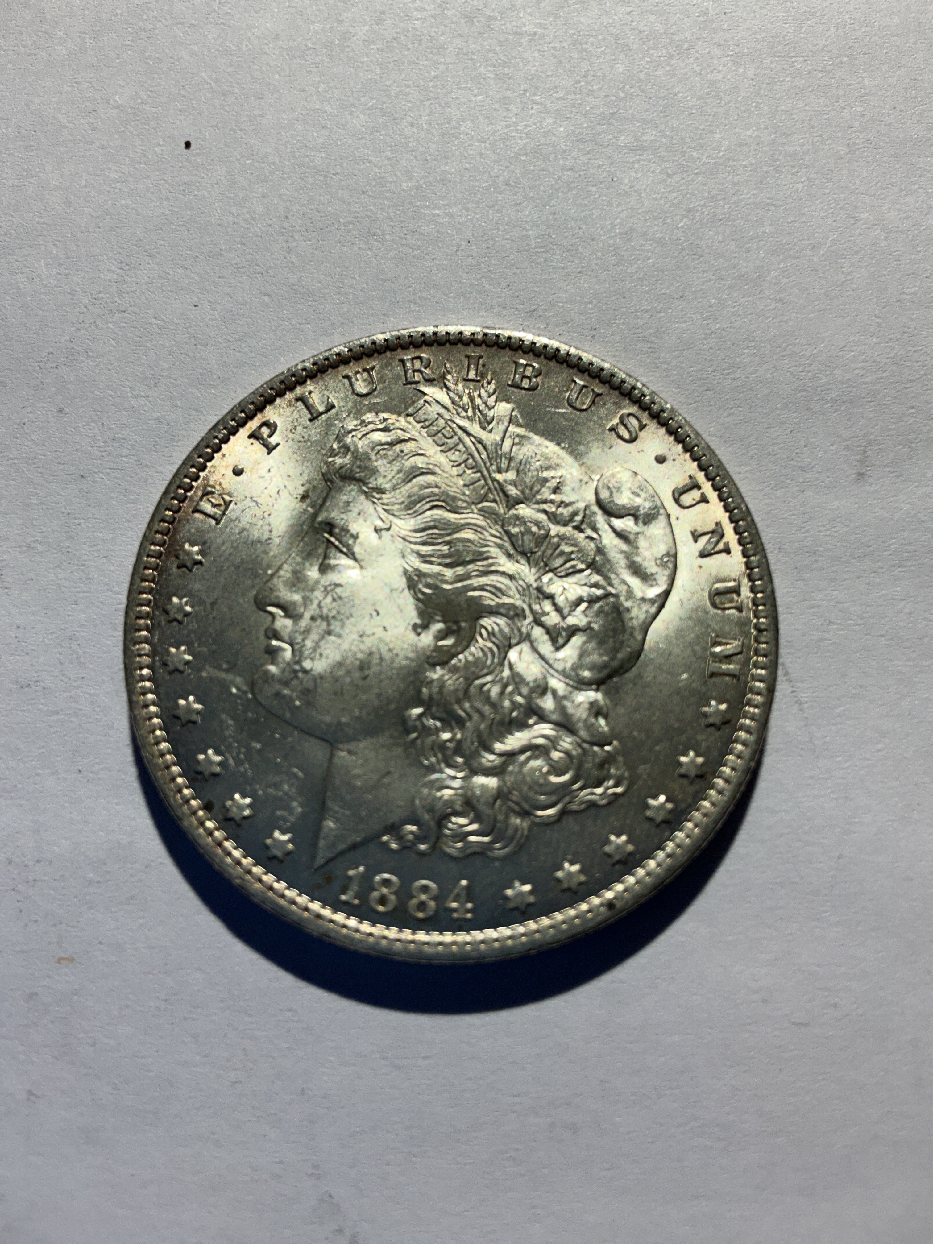 Lot 30, 1884 O Morgan silver dollar, BU