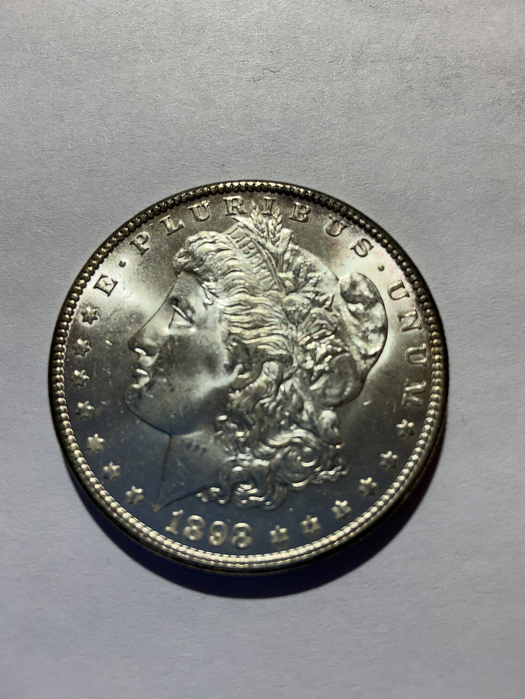 Lot 76, 1898 O Morgan silver dollar, BU