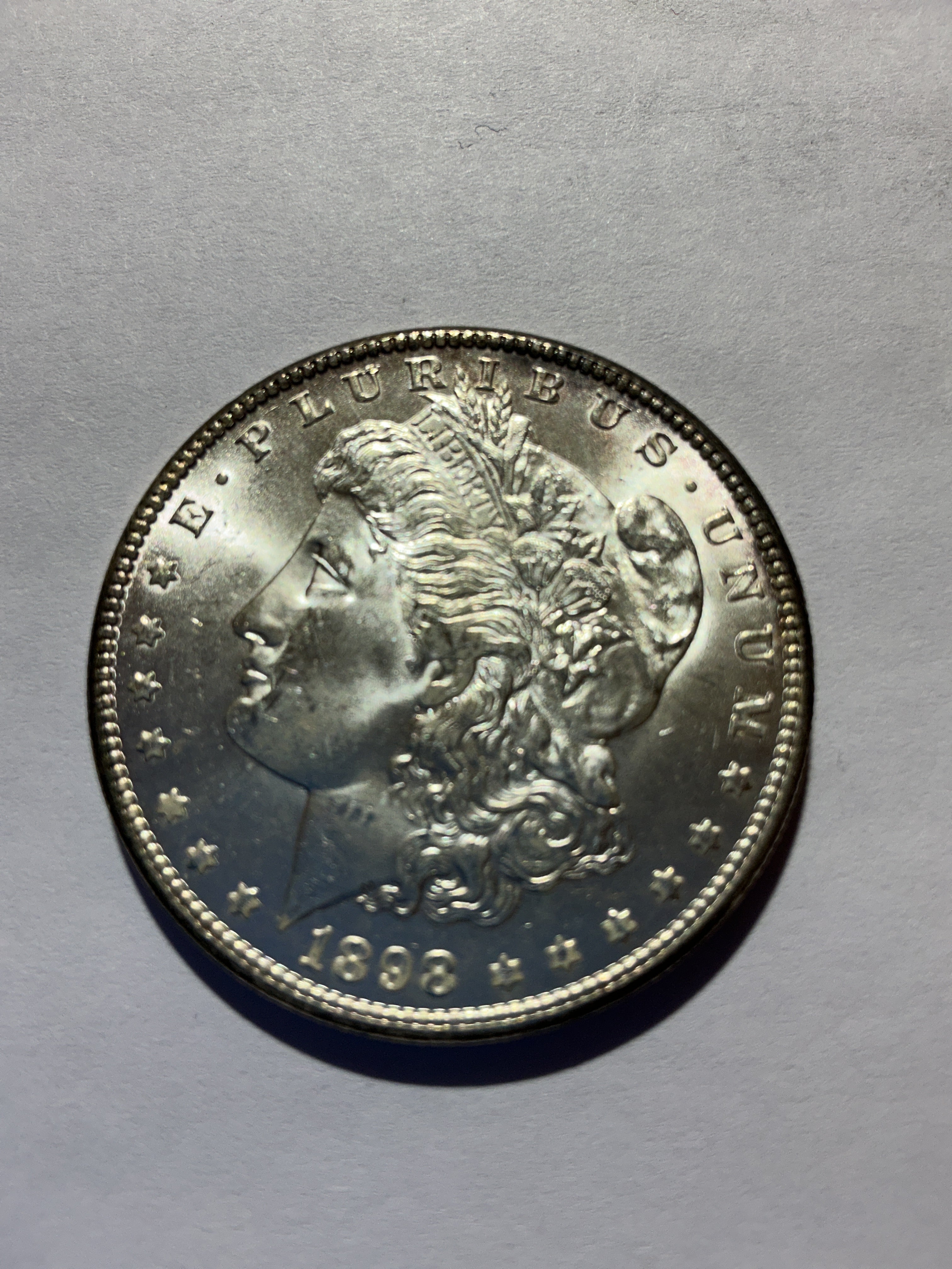 Lot 76, 1898 O Morgan silver dollar, BU