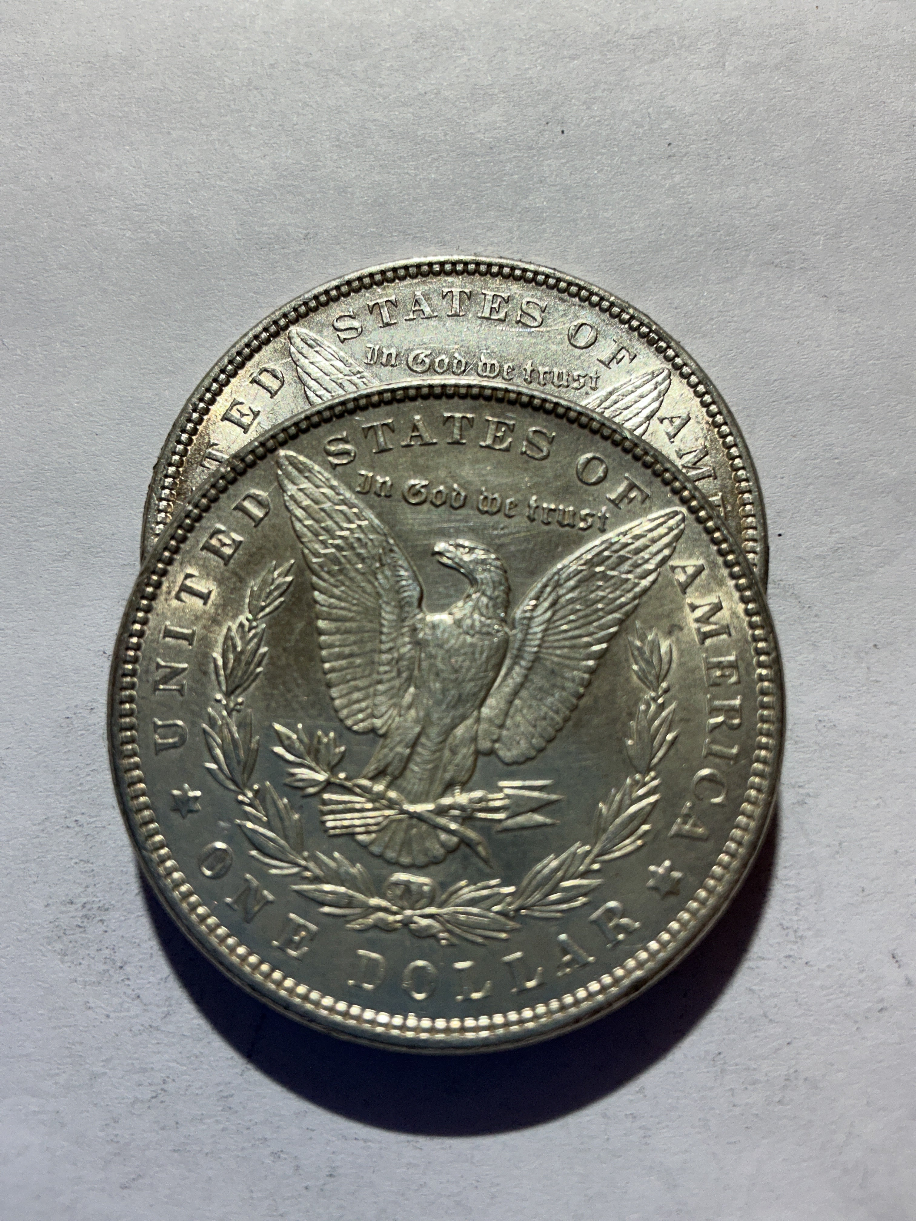 Lot 60, 2 1898 Morgan silver dollar, AU