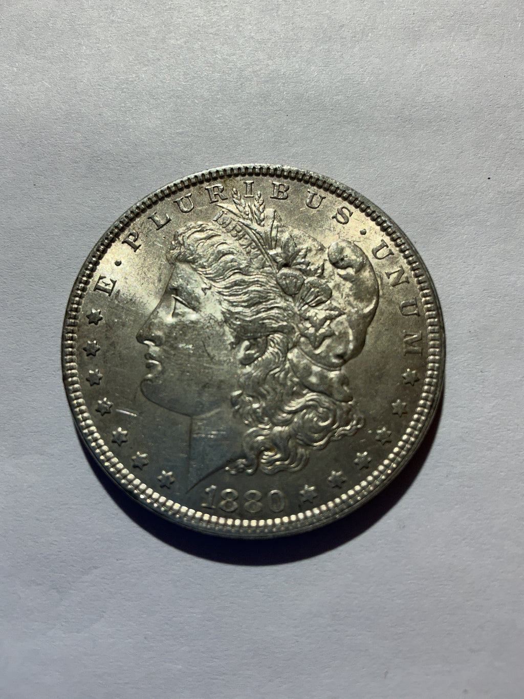 Lot 38, 1880 Morgan silver dollar, AU