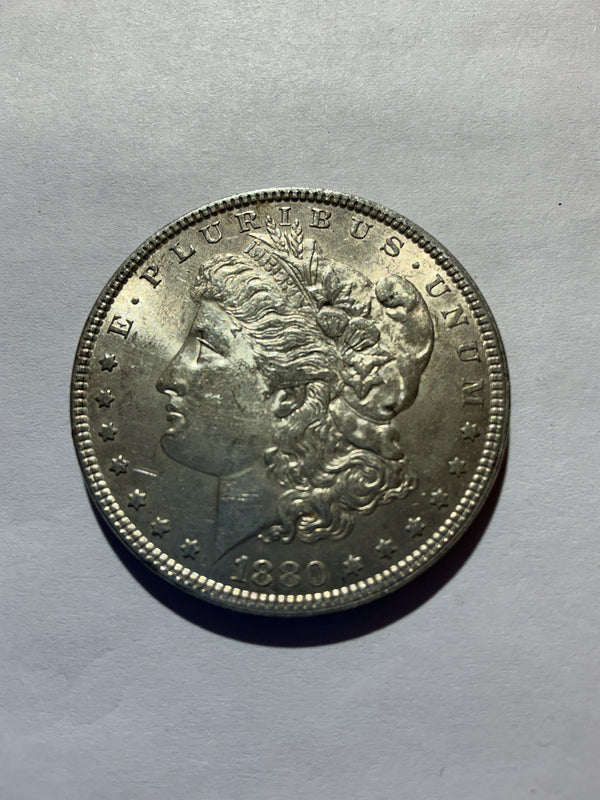 Lot 38, 1880 Morgan silver dollar, AU