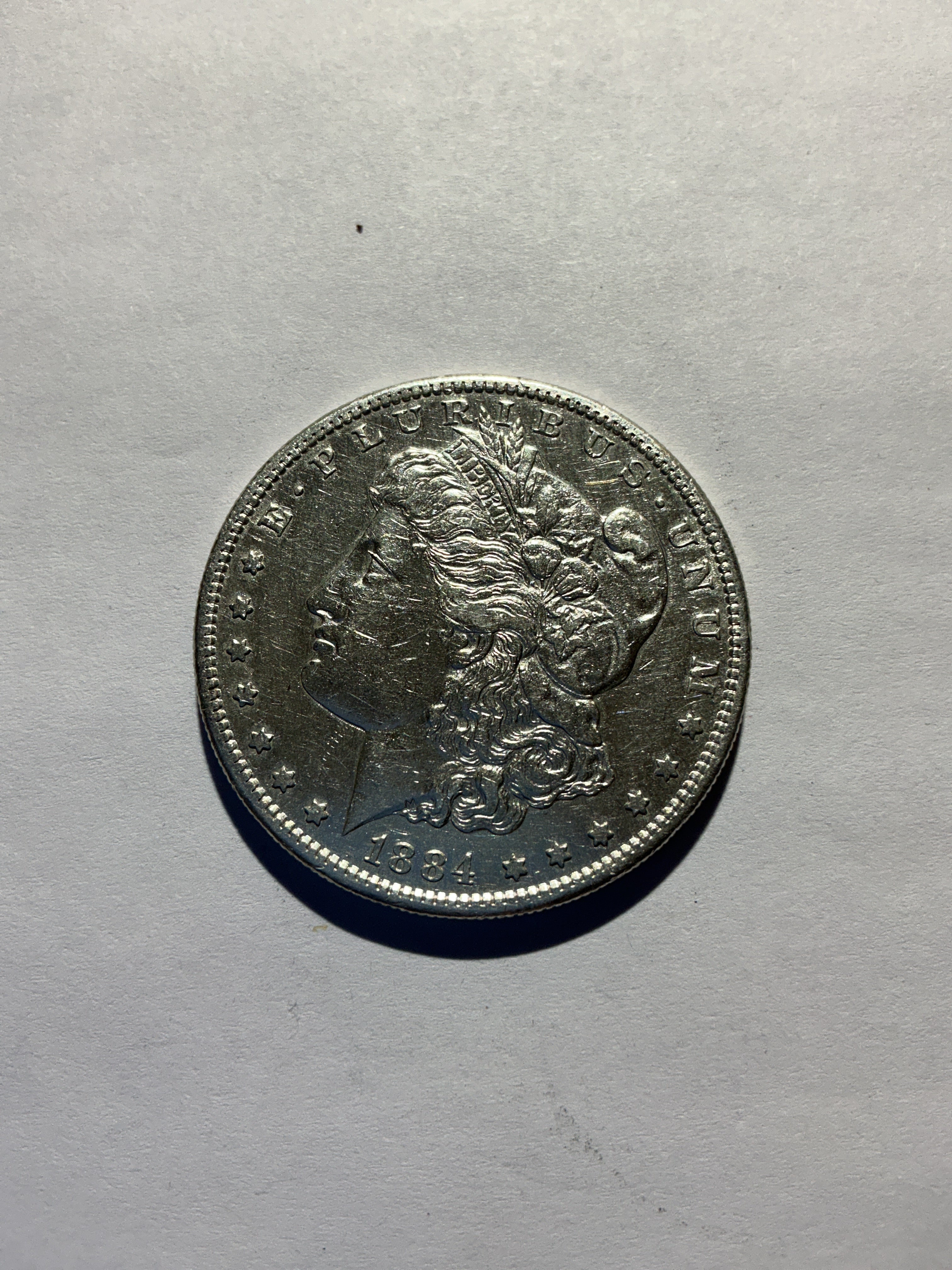 Lot 11, 1884 S Morgan silver dollar, Xf