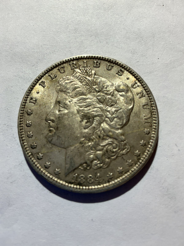 Lot 50, 1884 Morgan silver dollar, AU