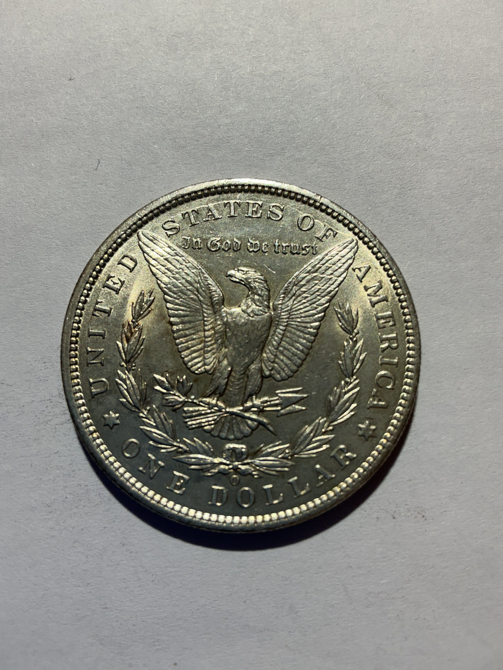 Lot 12, 1900 O Morgan silver dollar, AU