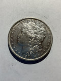 Lot 43, 1881 O Morgan silver dollar, AU