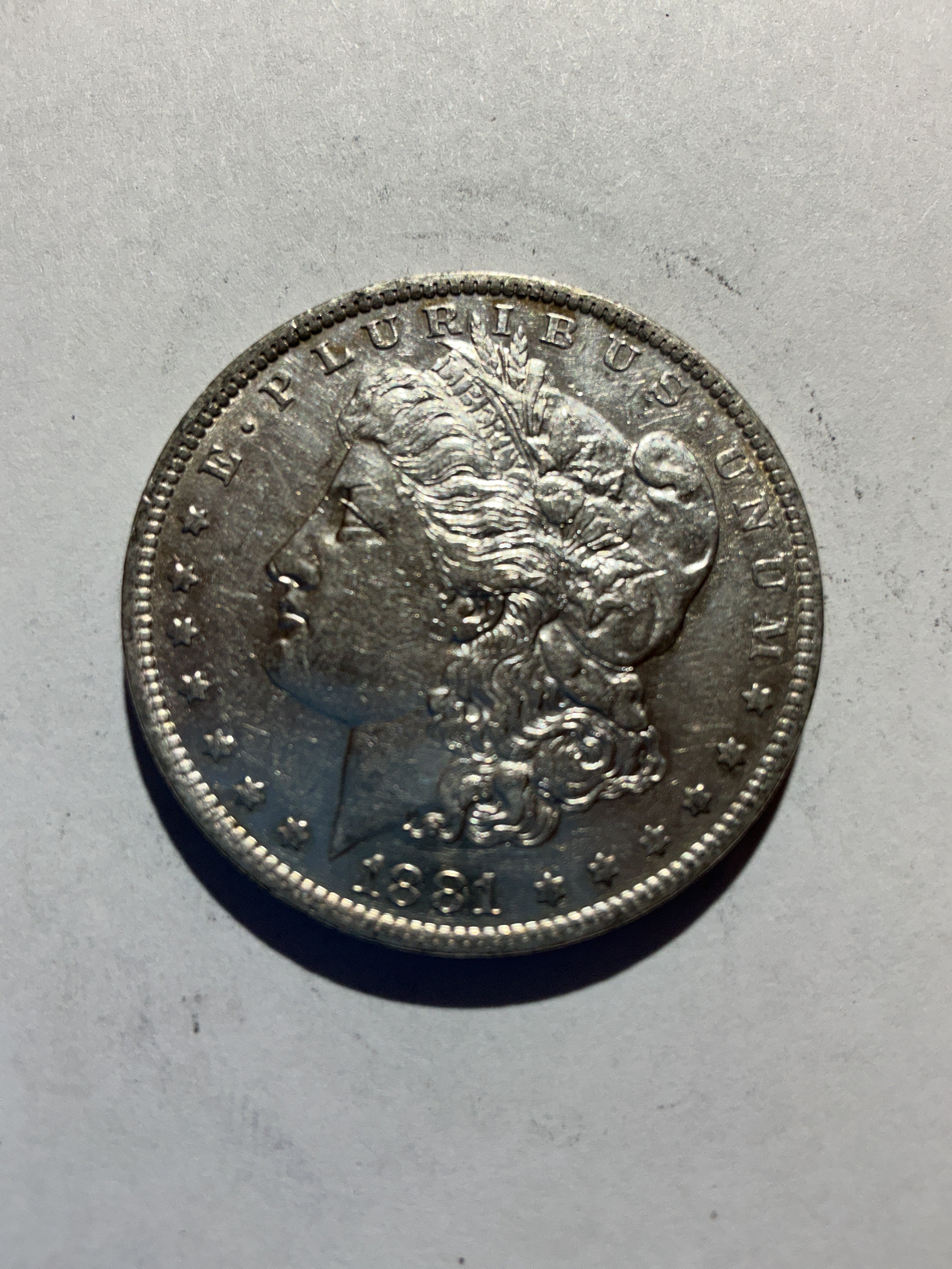 Lot 43, 1881 O Morgan silver dollar, AU