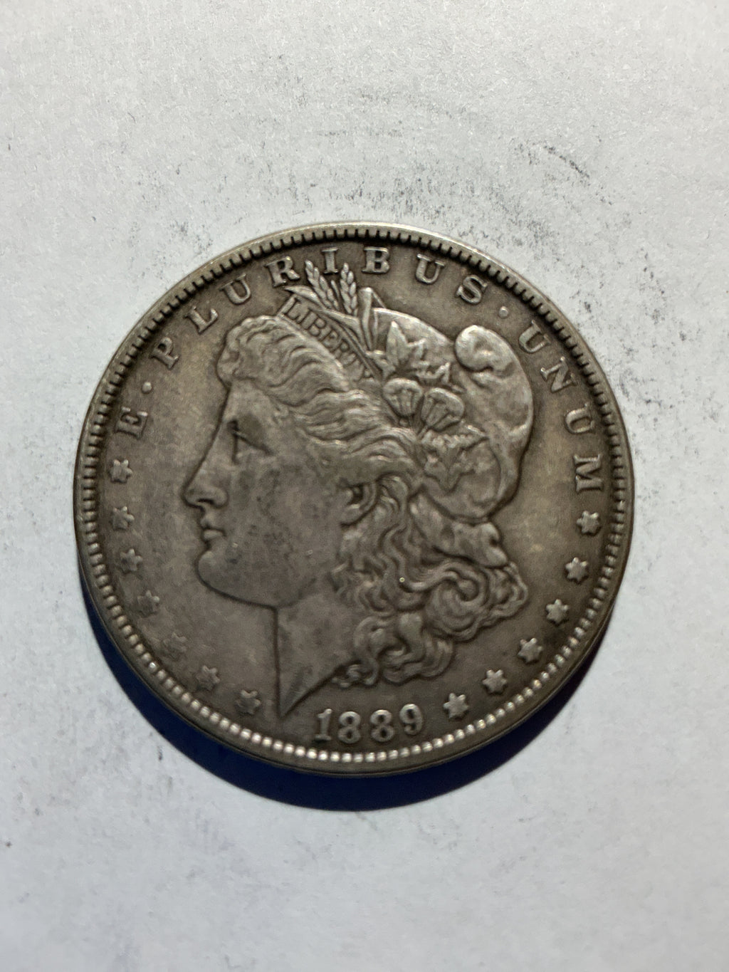 Lot 68, 1889 Morgan silver dollar, xf