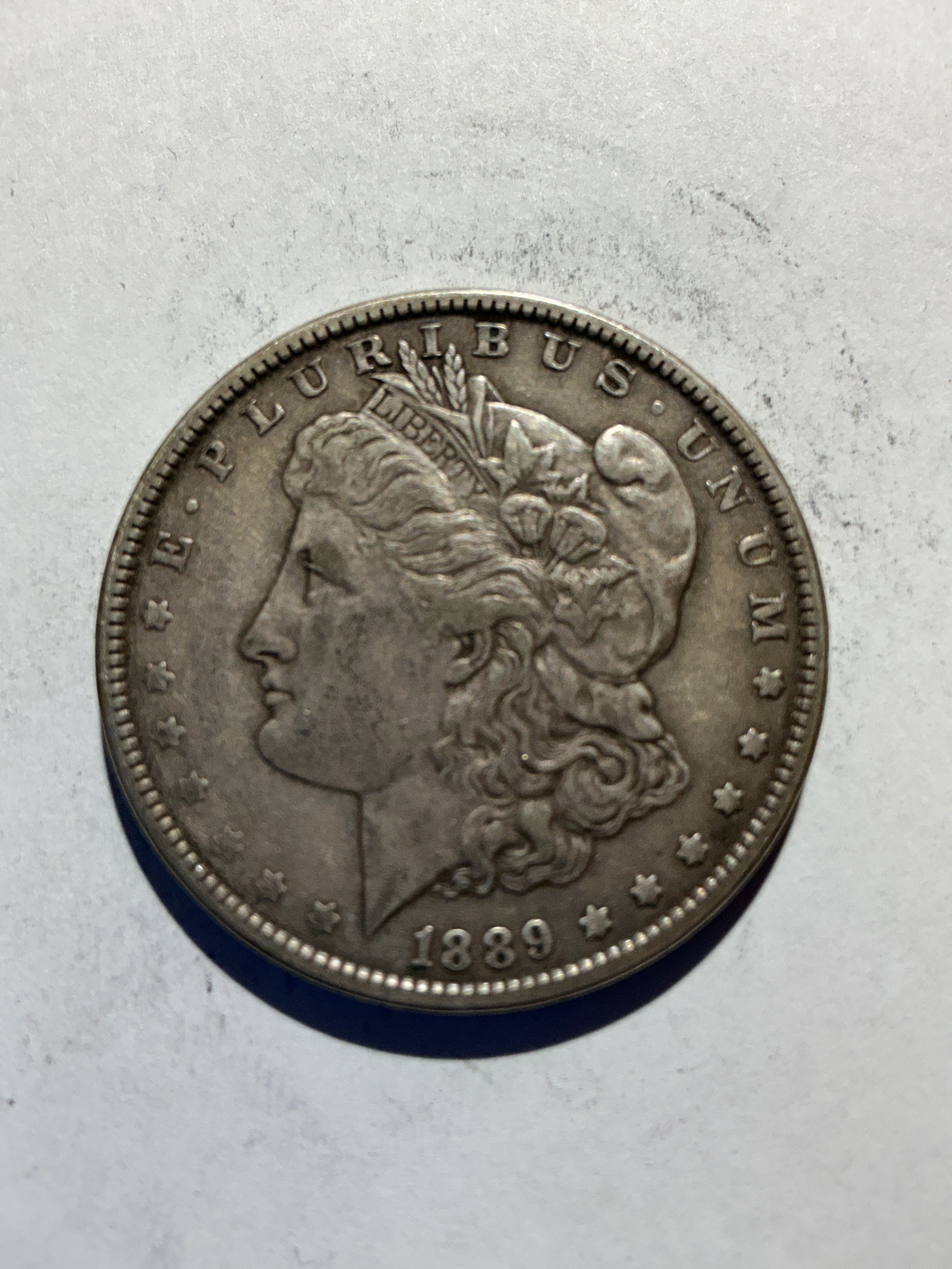 Lot 68, 1889 Morgan silver dollar, xf