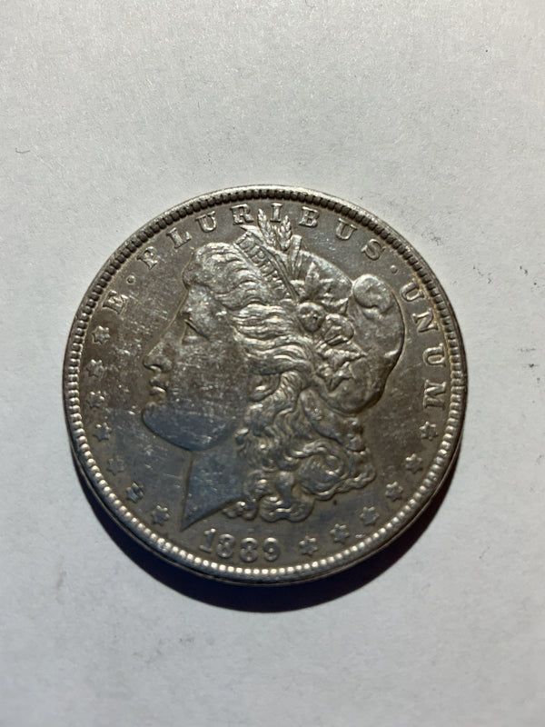 Lot 28, 1889 Morgan silver dollar ,xf