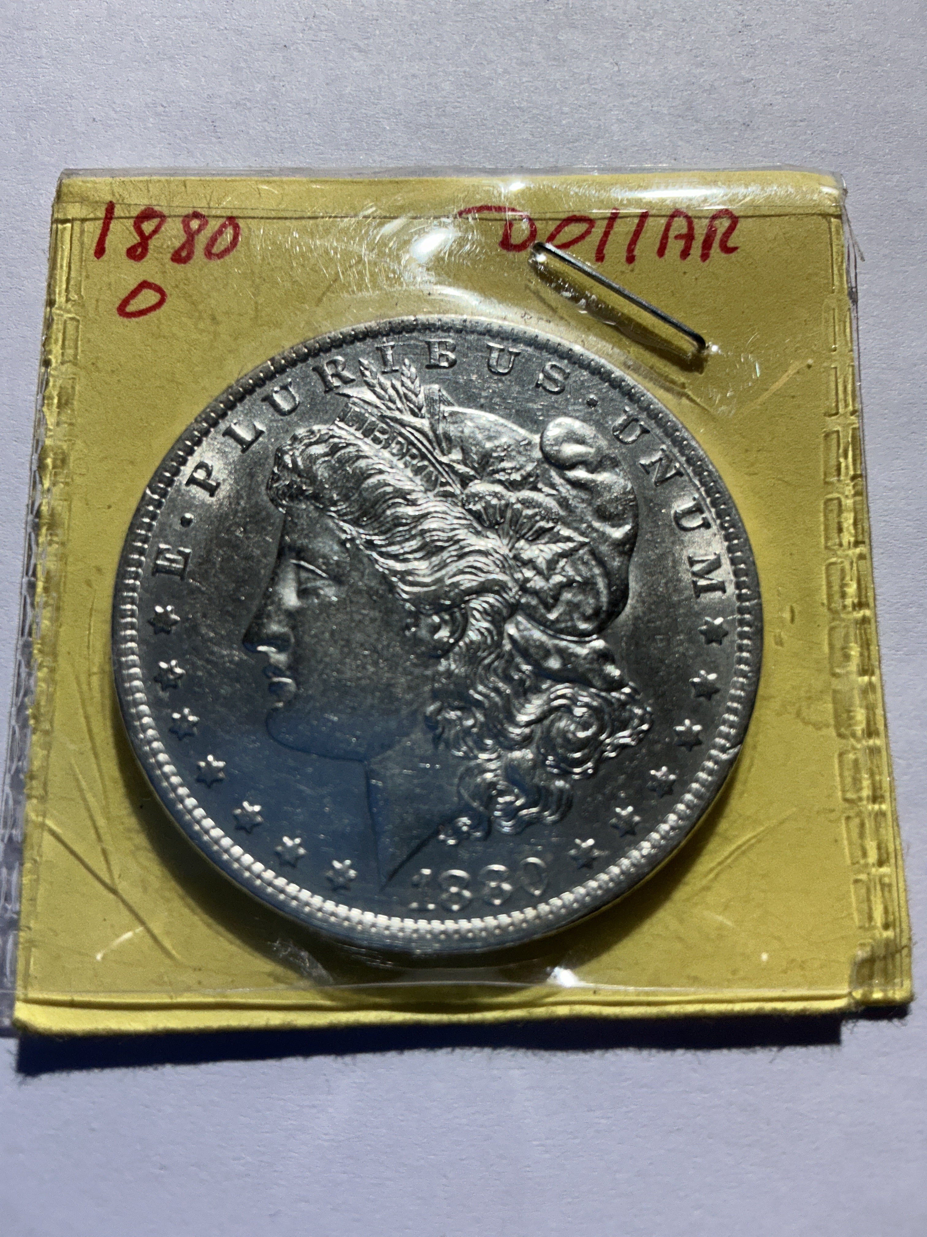 Lot 17, 1880 O Morgan silver dollar, AU