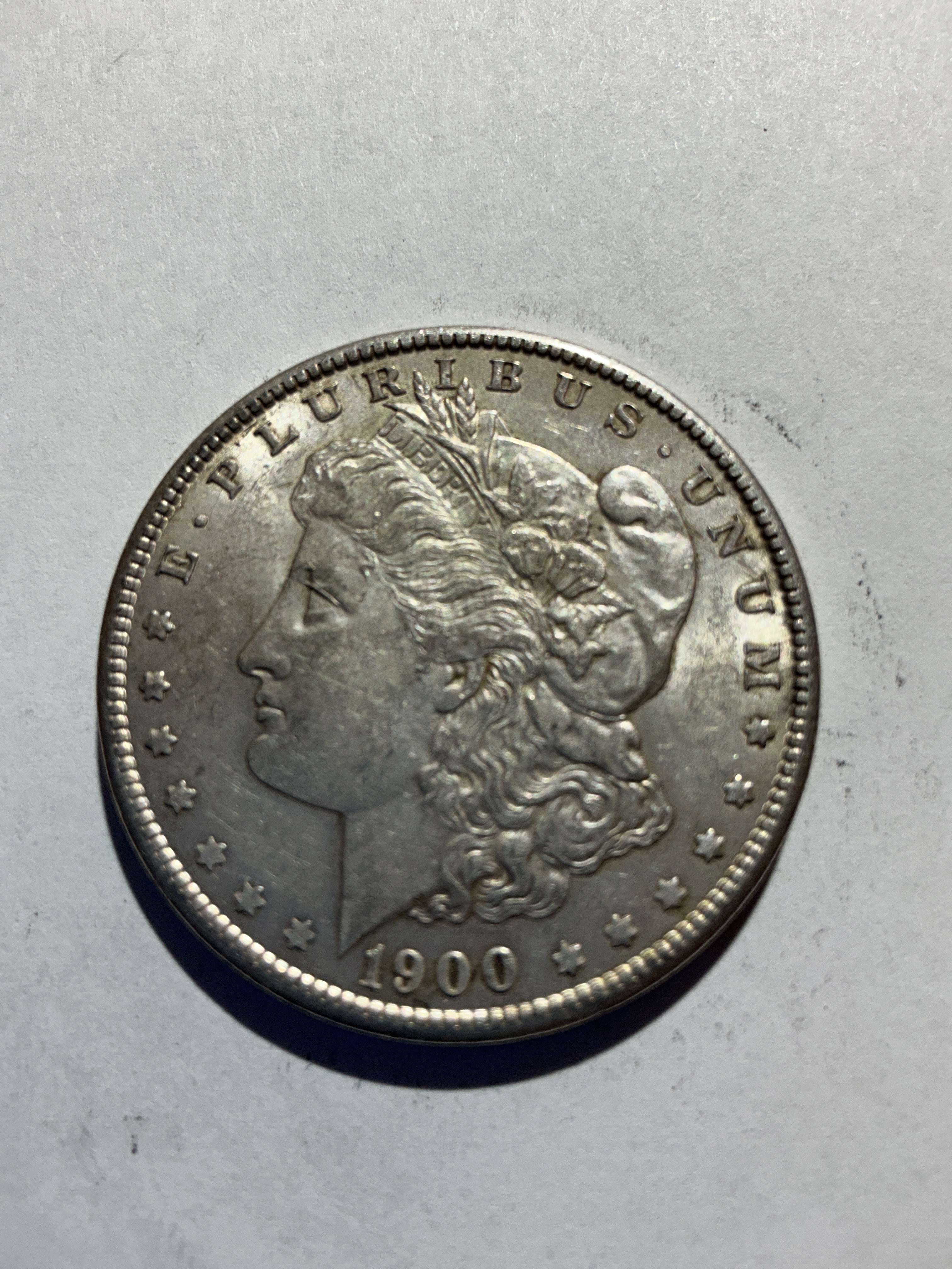 Lot 37, 1900 Morgan silver dollar, AU nice coin